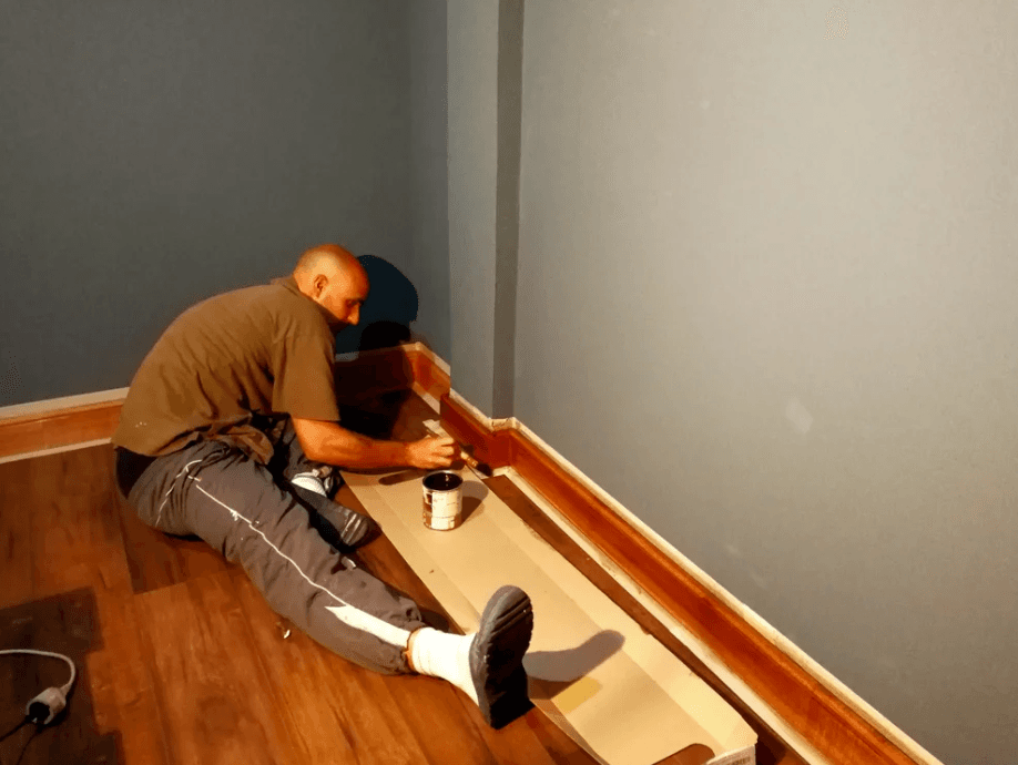 Varnishing the skirting board